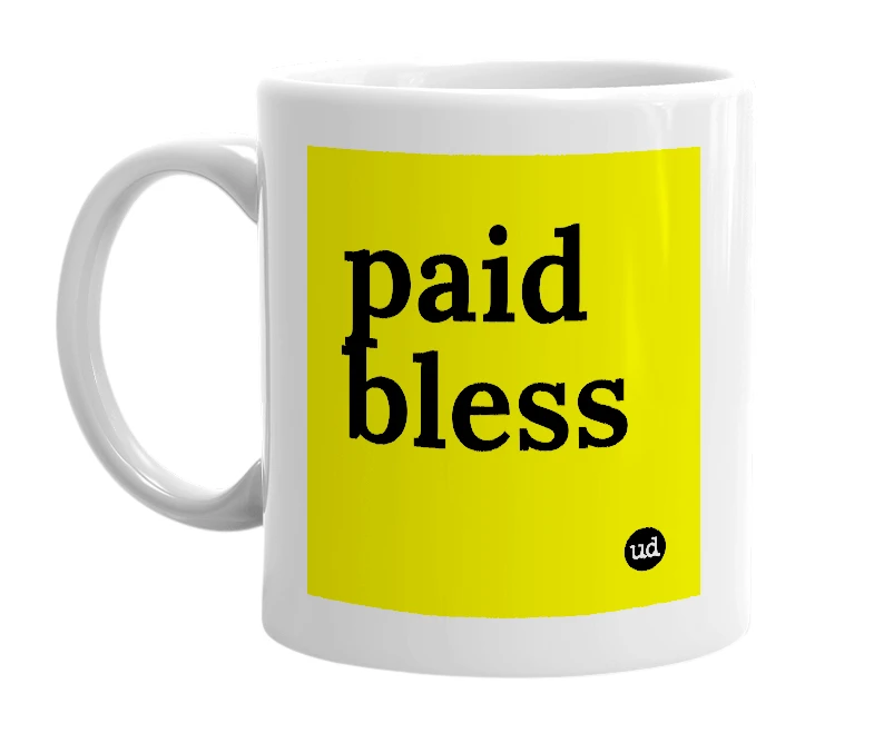 White mug with 'paid bless' in bold black letters