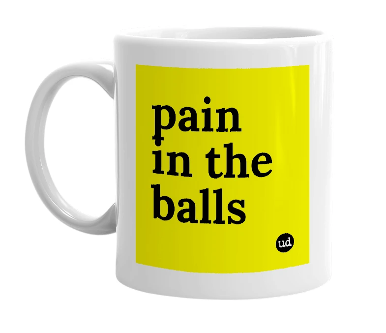 White mug with 'pain in the balls' in bold black letters