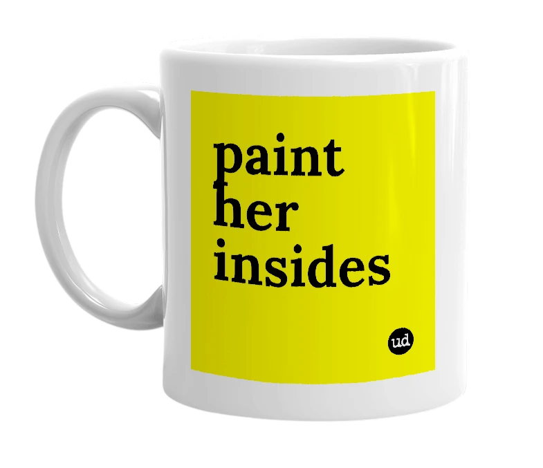 White mug with 'paint her insides' in bold black letters