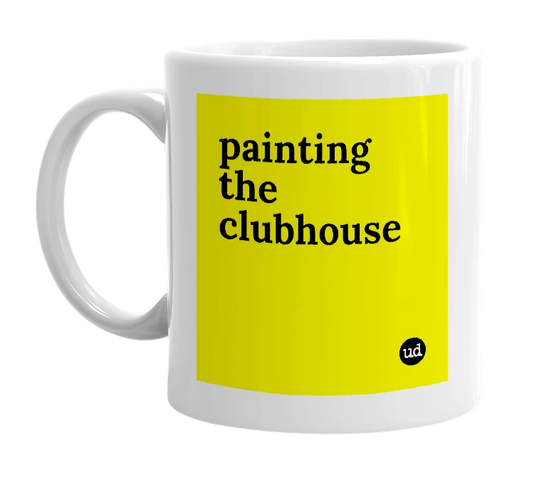White mug with 'painting the clubhouse' in bold black letters