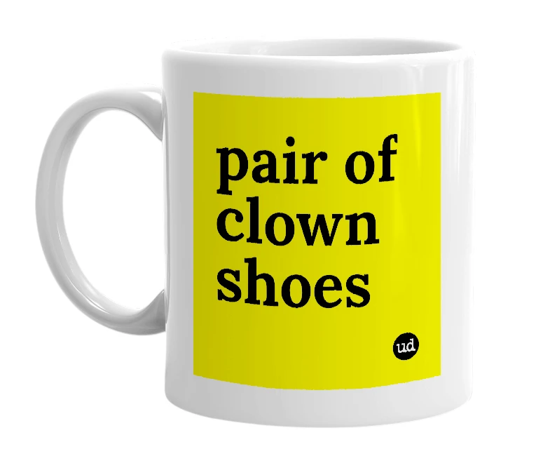 White mug with 'pair of clown shoes' in bold black letters