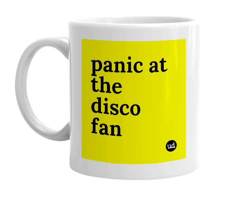 White mug with 'panic at the disco fan' in bold black letters