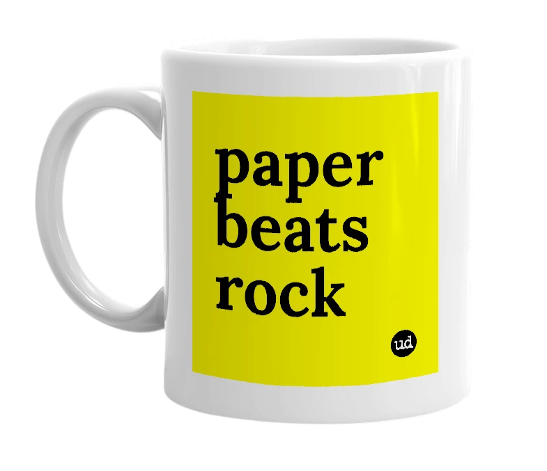 White mug with 'paper beats rock' in bold black letters