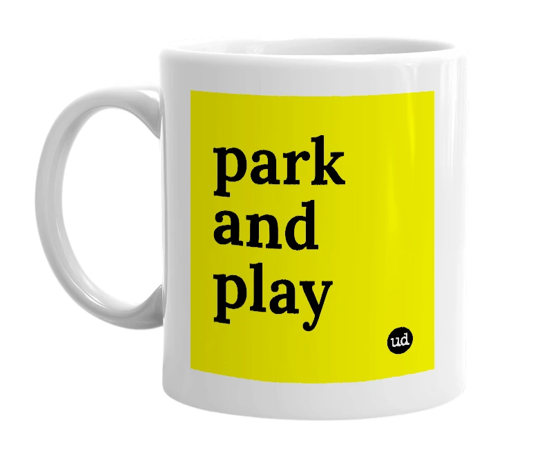 White mug with 'park and play' in bold black letters