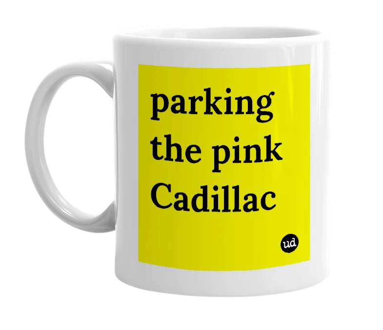 White mug with 'parking the pink Cadillac' in bold black letters