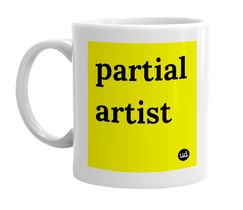 White mug with 'partial artist' in bold black letters