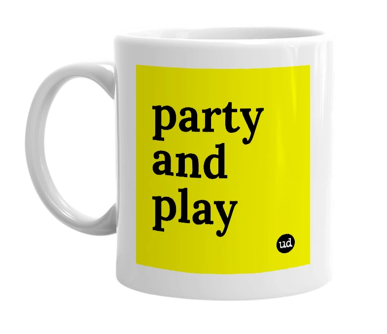 White mug with 'party and play' in bold black letters