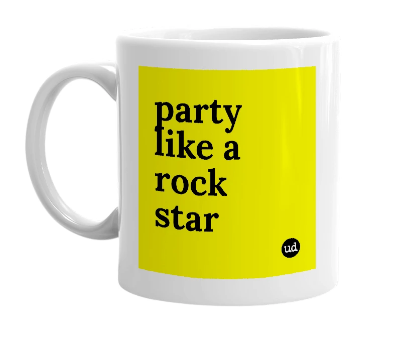 White mug with 'party like a rock star' in bold black letters