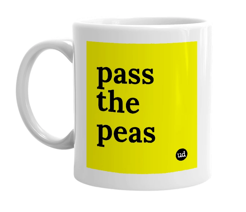 White mug with 'pass the peas' in bold black letters