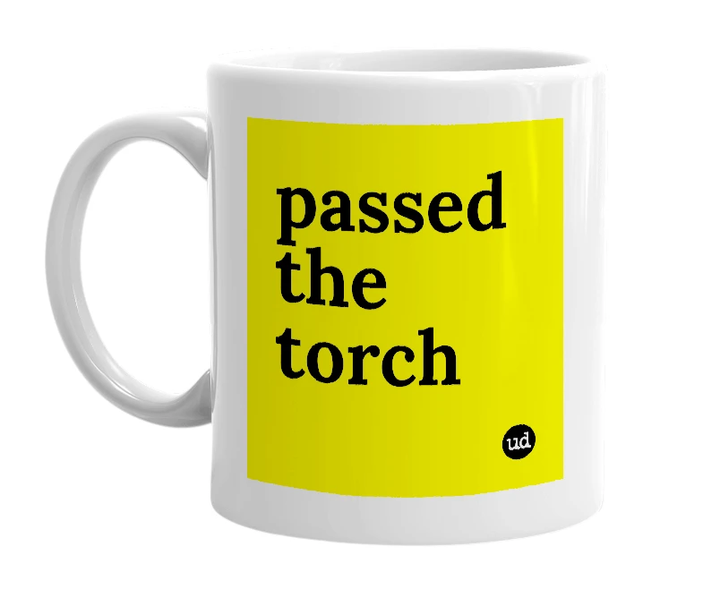 White mug with 'passed the torch' in bold black letters