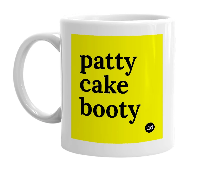 White mug with 'patty cake booty' in bold black letters