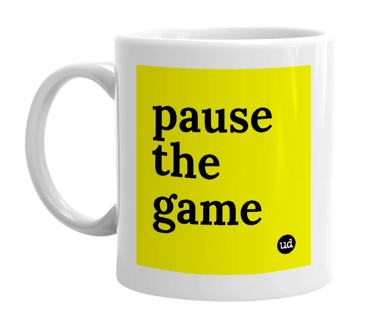 White mug with 'pause the game' in bold black letters