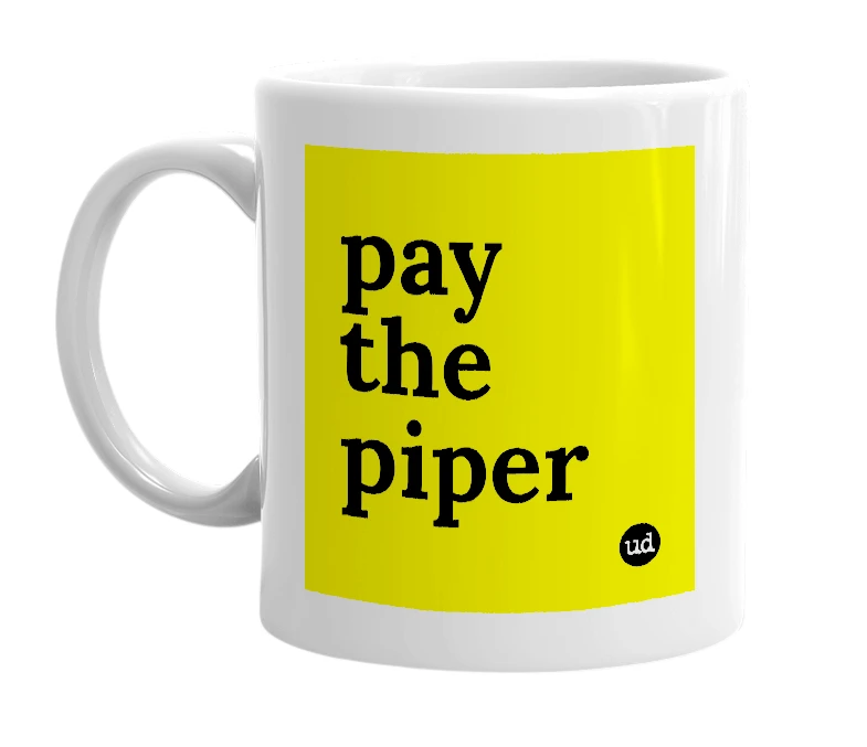 White mug with 'pay the piper' in bold black letters