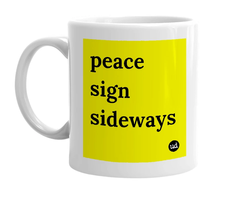 White mug with 'peace sign sideways' in bold black letters