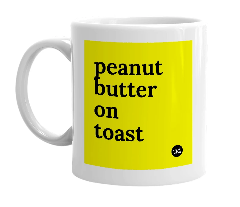 White mug with 'peanut butter on toast' in bold black letters