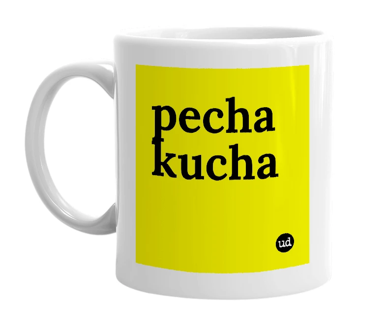 White mug with 'pecha kucha' in bold black letters