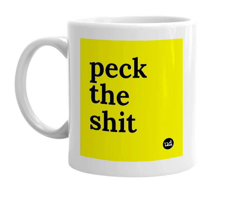 White mug with 'peck the shit' in bold black letters