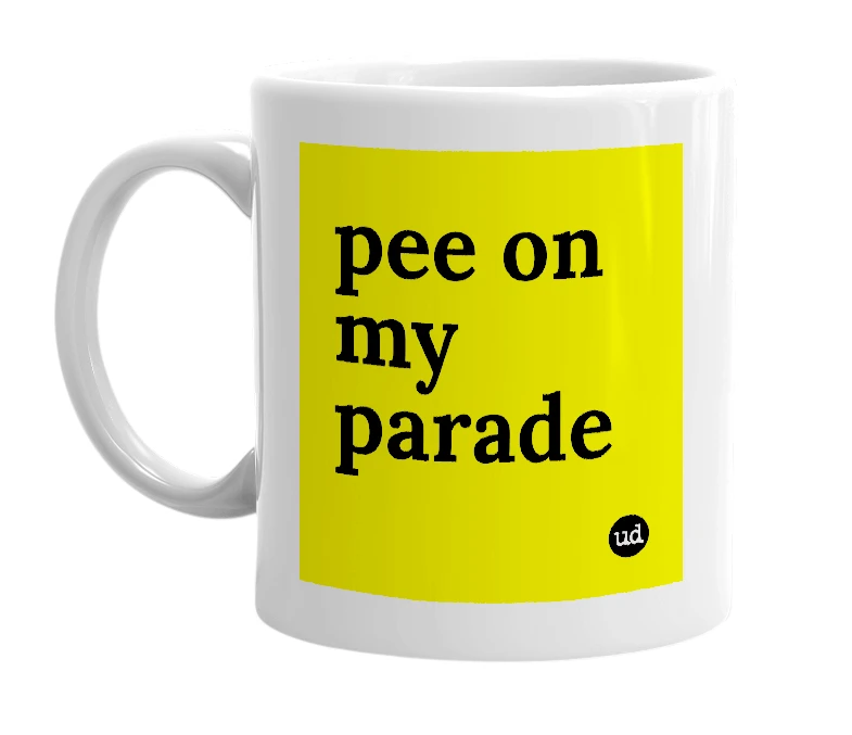 White mug with 'pee on my parade' in bold black letters