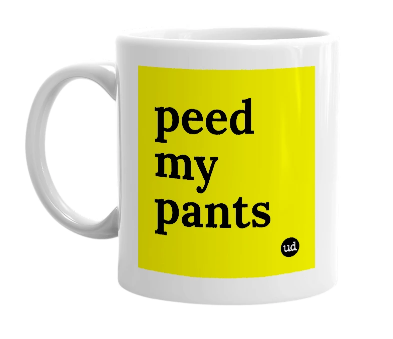 White mug with 'peed my pants' in bold black letters