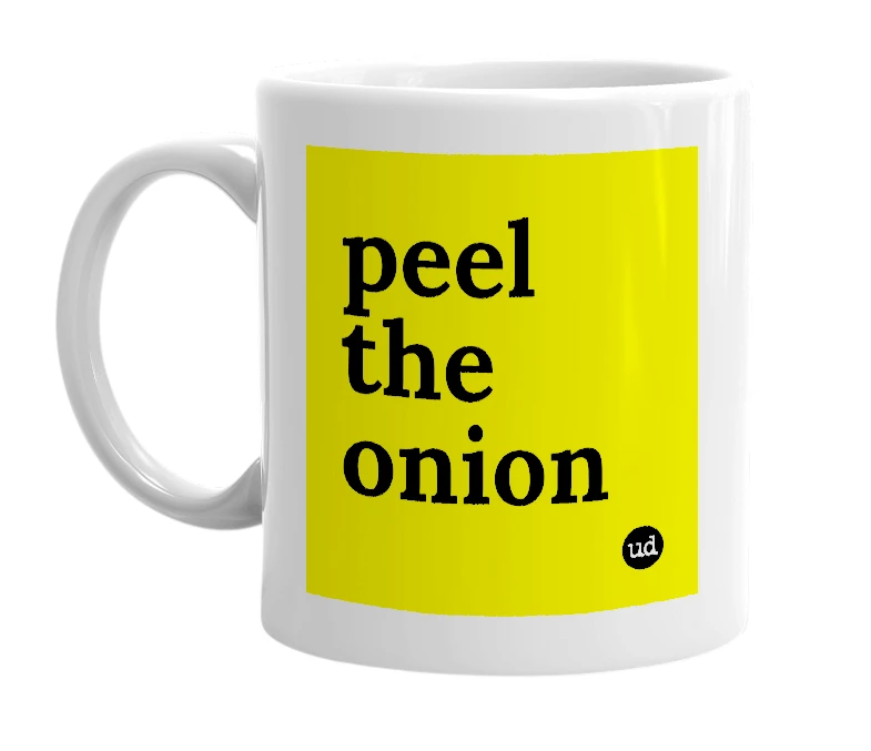 White mug with 'peel the onion' in bold black letters