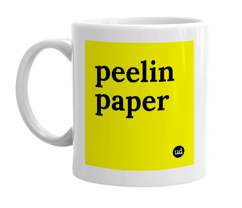 White mug with 'peelin paper' in bold black letters