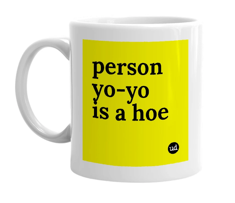 White mug with 'person yo-yo is a hoe' in bold black letters