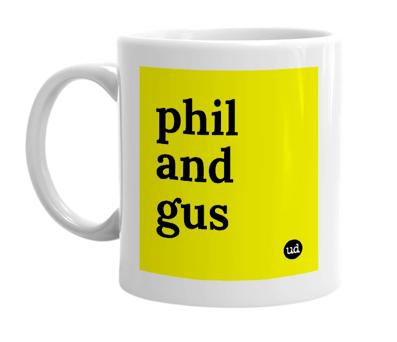 White mug with 'phil and gus' in bold black letters