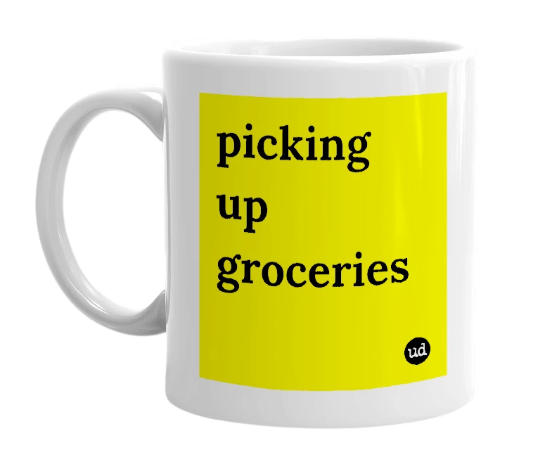 White mug with 'picking up groceries' in bold black letters