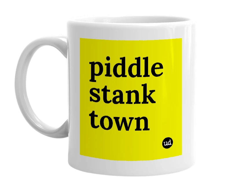 White mug with 'piddle stank town' in bold black letters