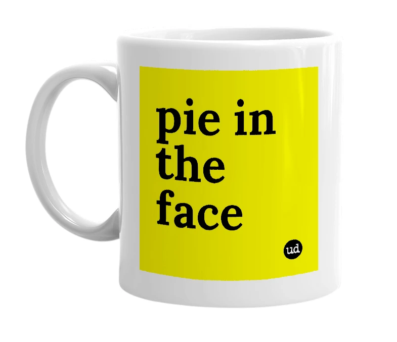 White mug with 'pie in the face' in bold black letters