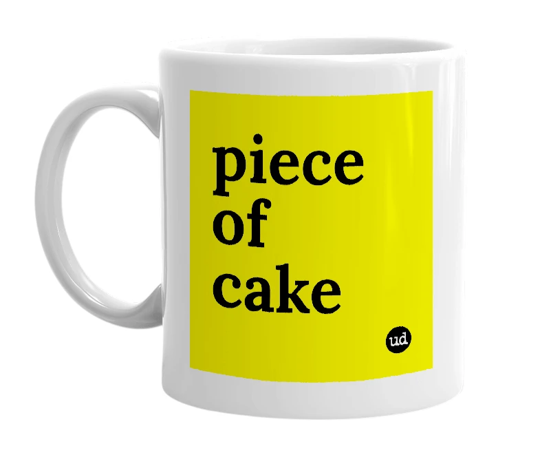 White mug with 'piece of cake' in bold black letters