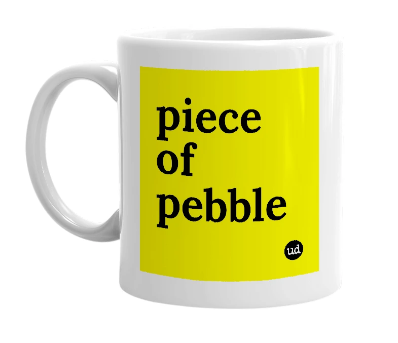 White mug with 'piece of pebble' in bold black letters