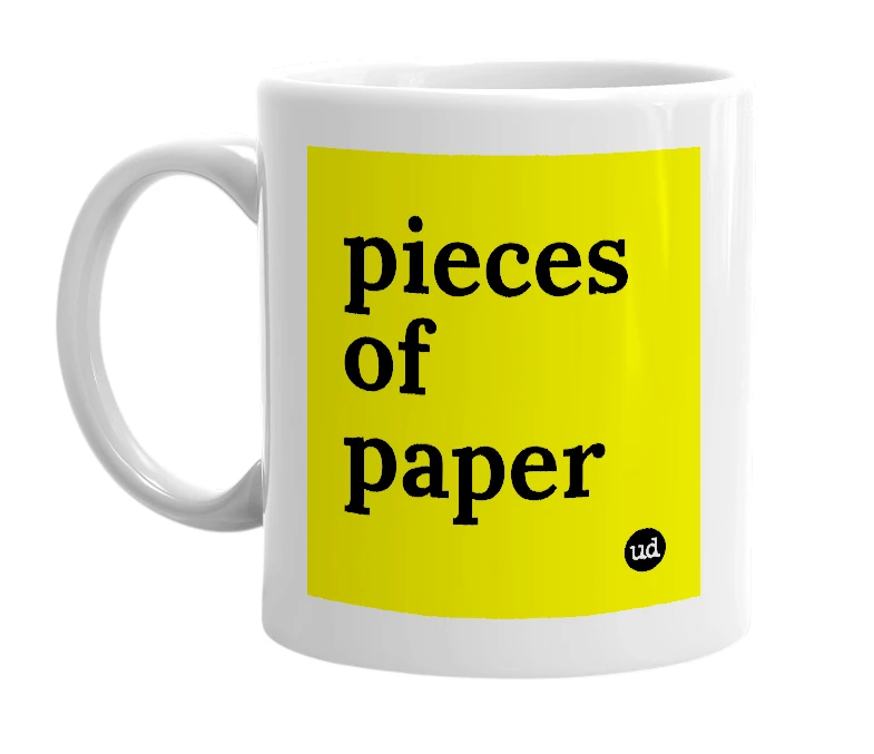 White mug with 'pieces of paper' in bold black letters