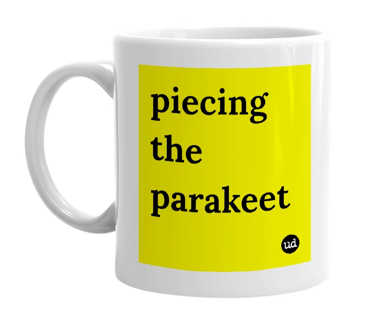 White mug with 'piecing the parakeet' in bold black letters