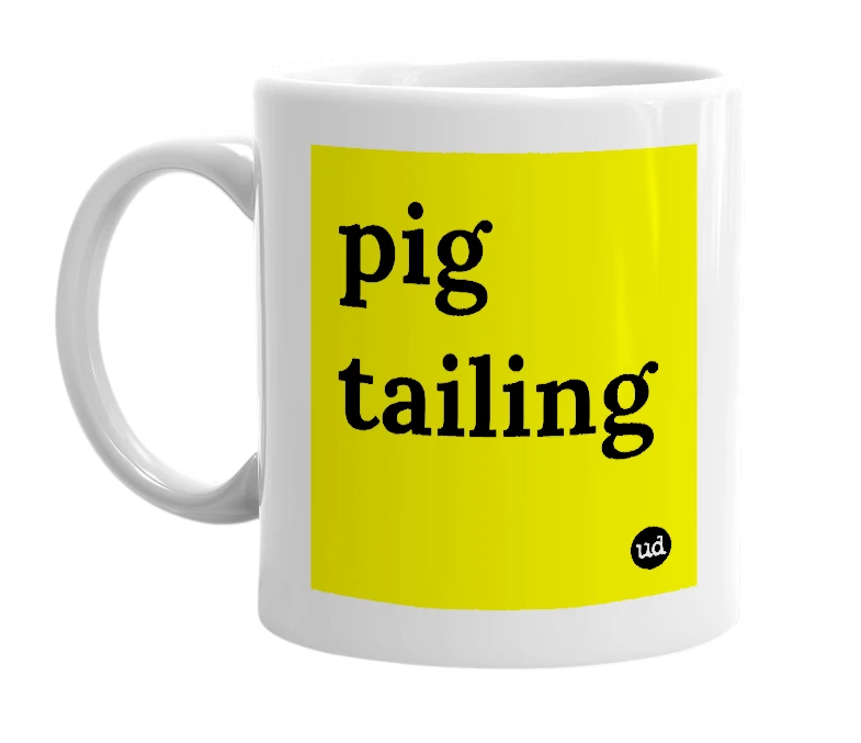 White mug with 'pig tailing' in bold black letters