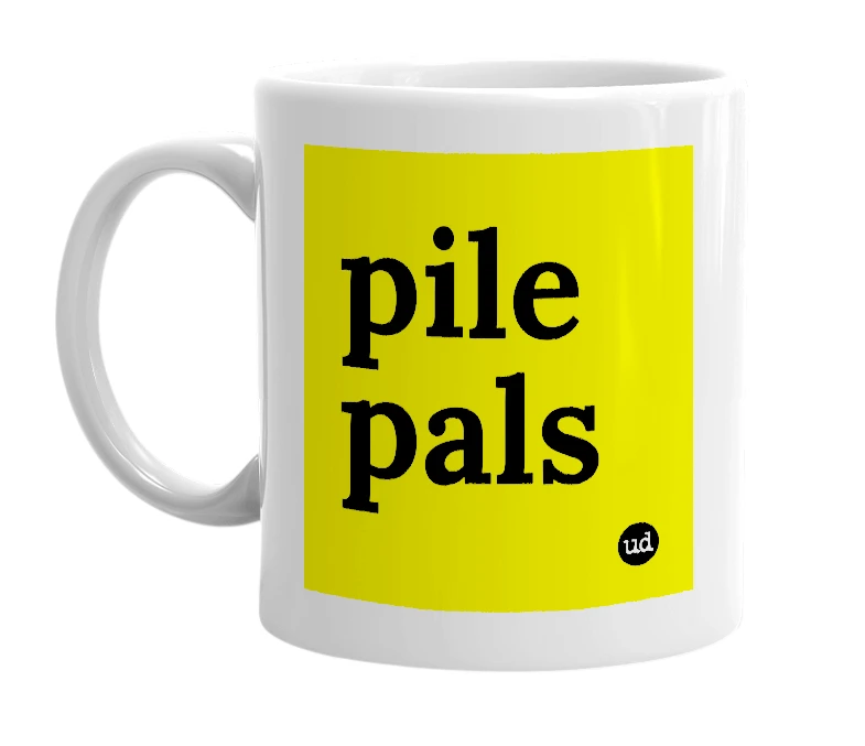 White mug with 'pile pals' in bold black letters