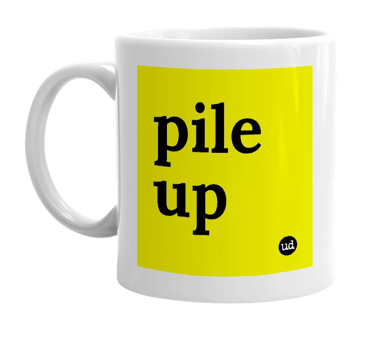 White mug with 'pile up' in bold black letters