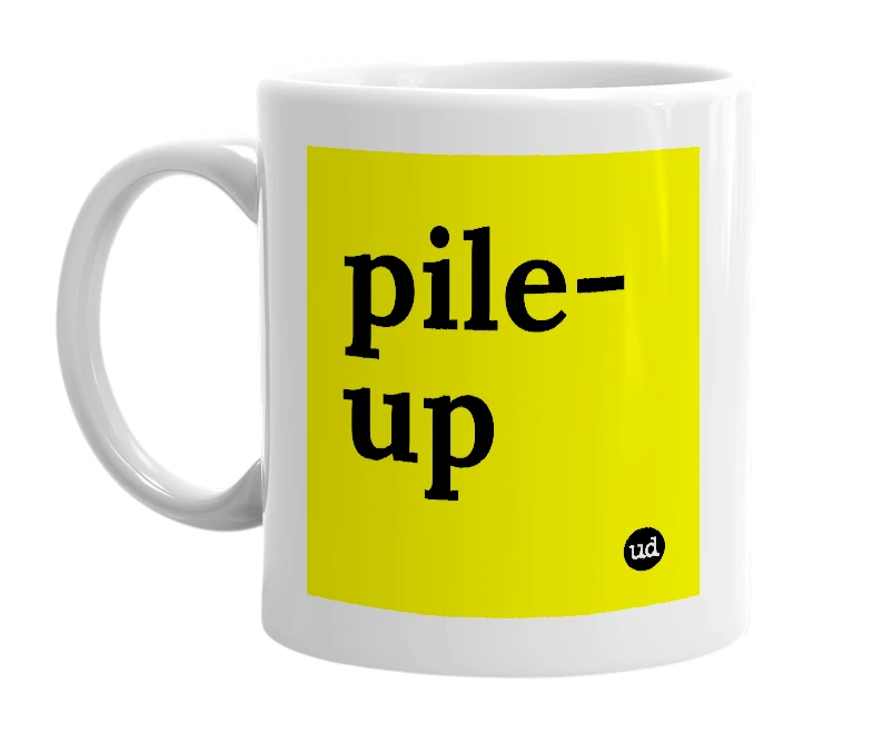 White mug with 'pile-up' in bold black letters