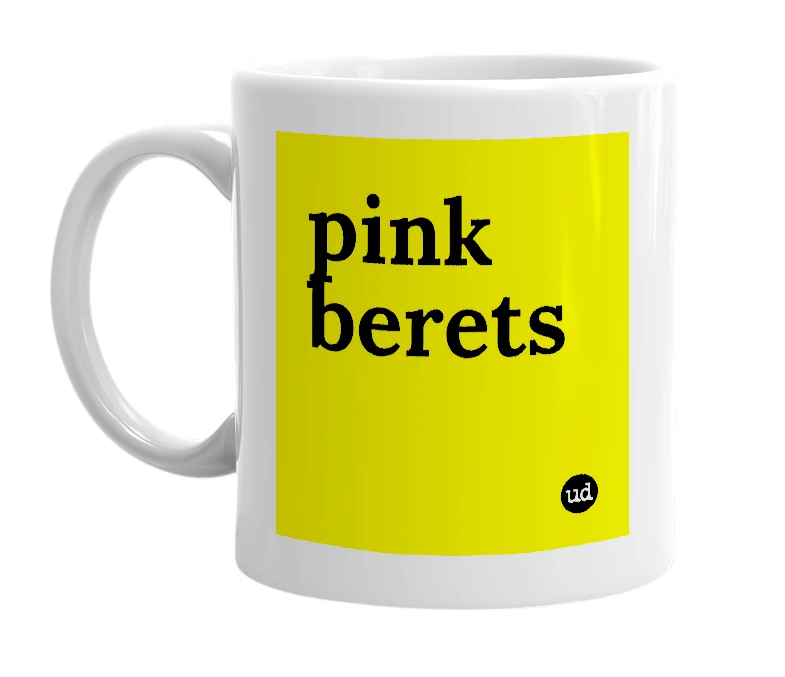 White mug with 'pink berets' in bold black letters