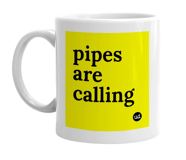 White mug with 'pipes are calling' in bold black letters