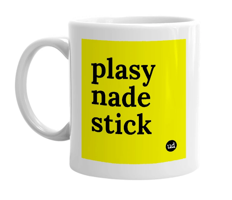 White mug with 'plasy nade stick' in bold black letters