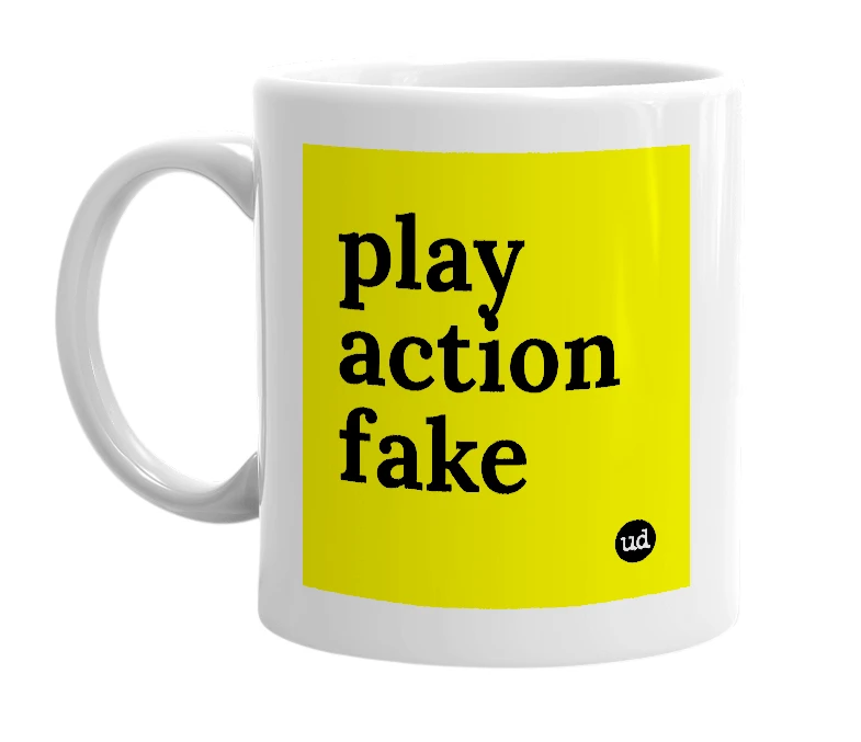 White mug with 'play action fake' in bold black letters