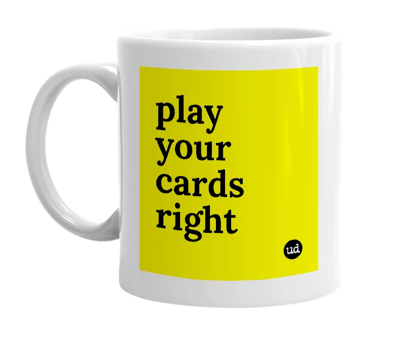 White mug with 'play your cards right' in bold black letters