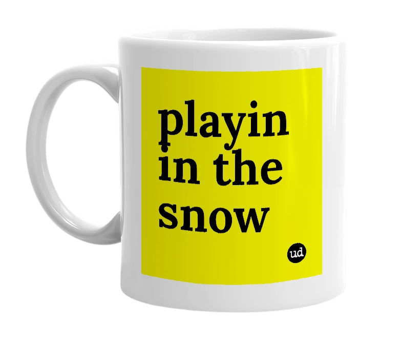 White mug with 'playin in the snow' in bold black letters