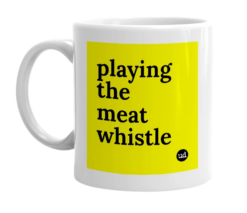 White mug with 'playing the meat whistle' in bold black letters