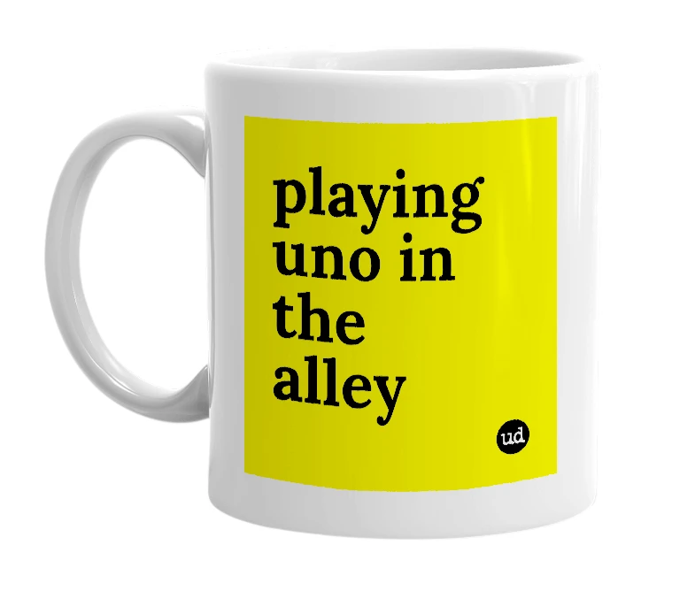 White mug with 'playing uno in the alley' in bold black letters
