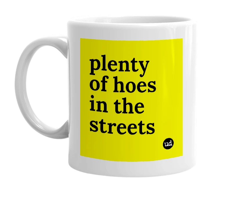 White mug with 'plenty of hoes in the streets' in bold black letters