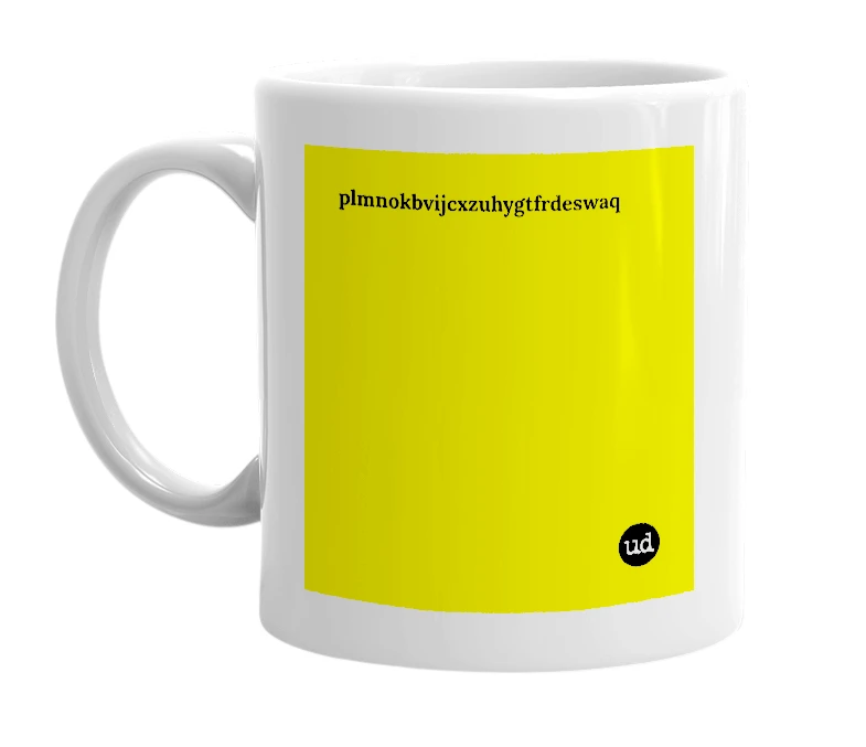 White mug with 'plmnokbvijcxzuhygtfrdeswaq' in bold black letters