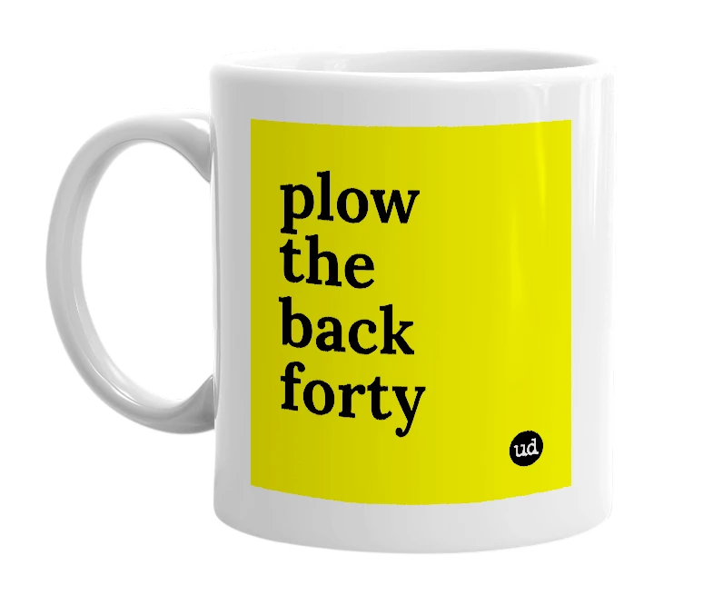 White mug with 'plow the back forty' in bold black letters