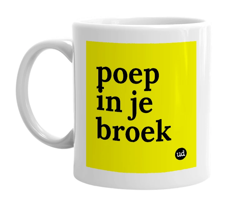 White mug with 'poep in je broek' in bold black letters